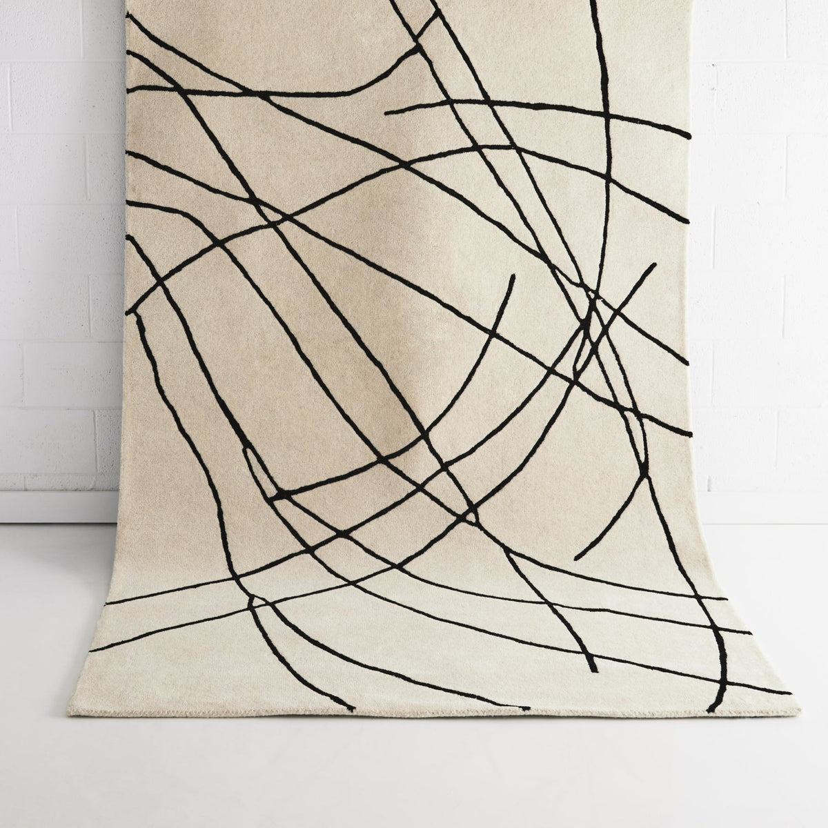 Alison Ivory Charcoal Wool Rug | Rug texture and styling detail