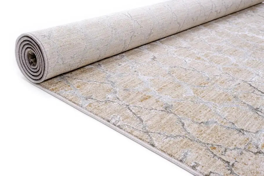 Rolled-up rug with a pattern on a white background