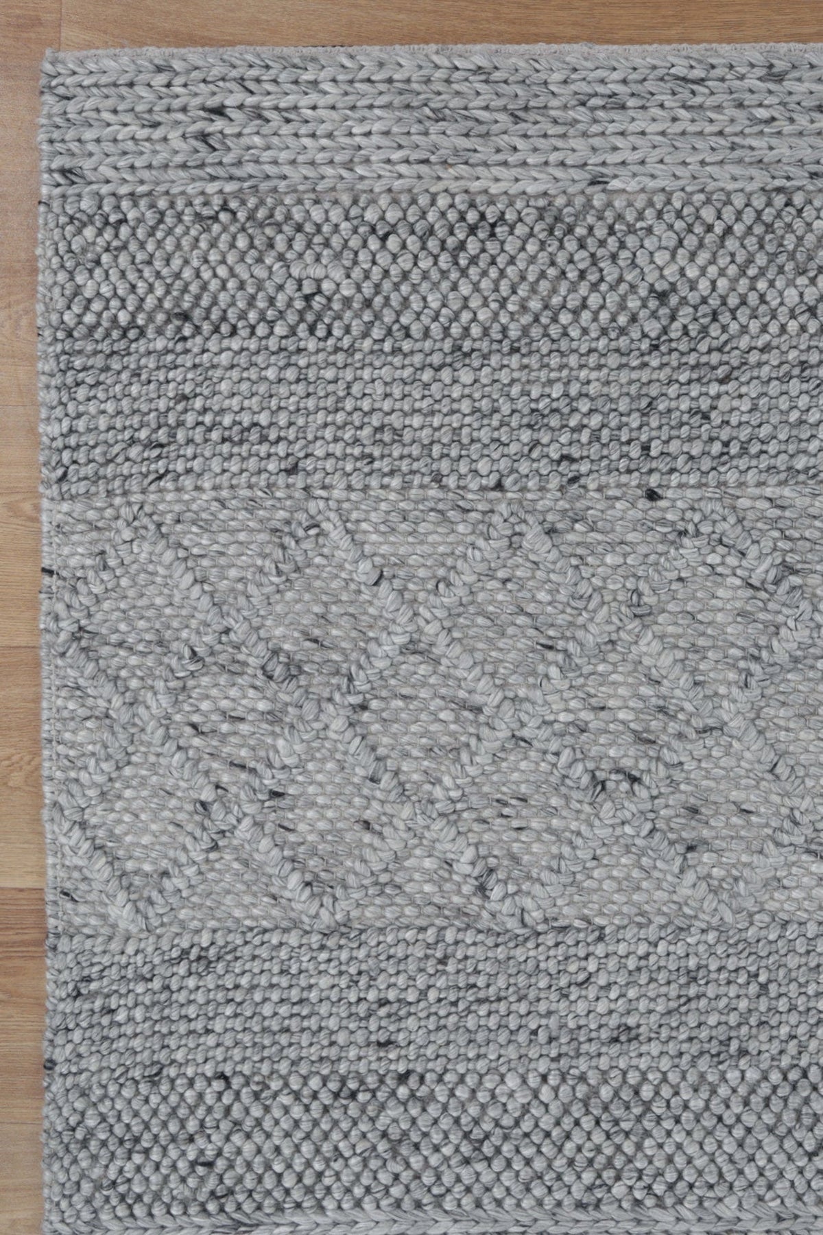 Bella Handwoven Wool Steel Rug – alternate styling photograph