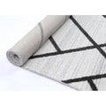 Archer Herring Rug Sand – rolled rug perspective