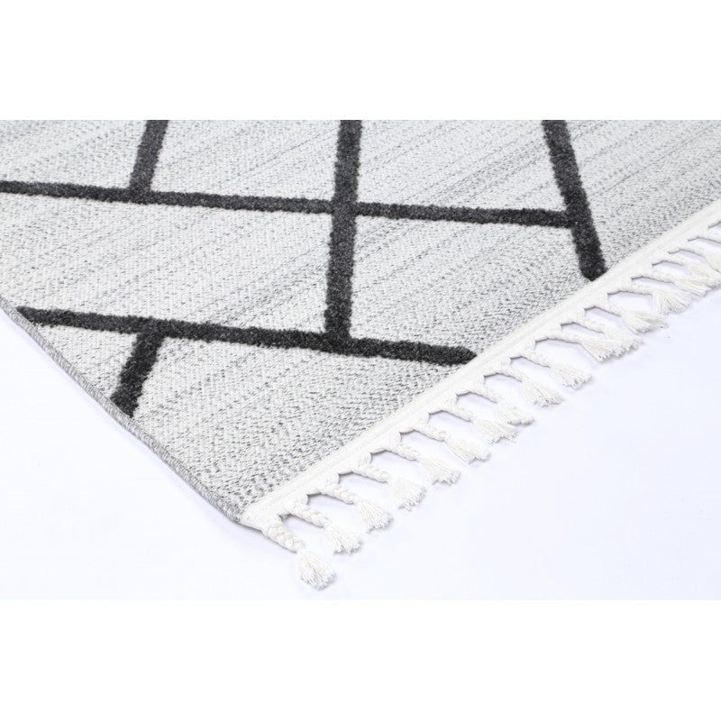 Archer Herring Rug Sand – edge and fringe detail